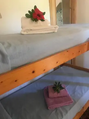 Letto o letti in una camera di Villa Satta