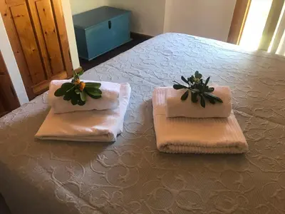 Letto o letti in una camera di Villa Satta