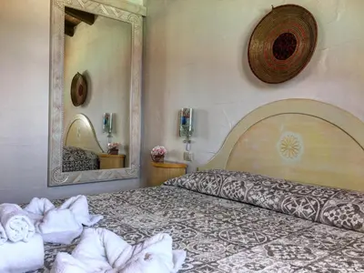 Letto o letti in una camera di Il Dolce Risveglio Tanca Piras