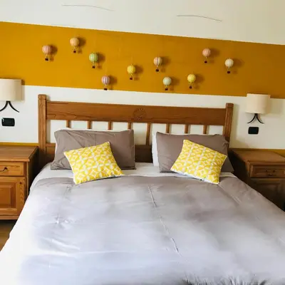 Letto o letti in una camera di Charming Rooms Opuntia