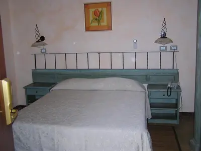 Letto o letti in una camera di Hotel Mistral