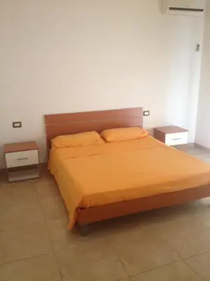 Letto o letti in una camera di fausthome