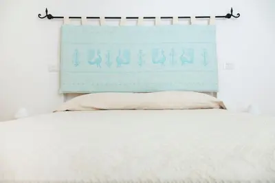 Letto o letti in una camera di Via dei Mari Guest House