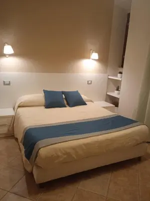 Letto o letti in una camera di Hotel Moderno