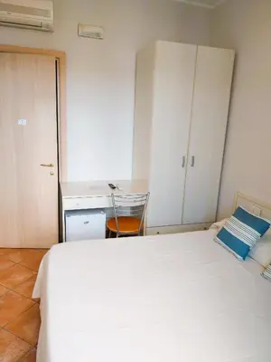Letto o letti in una camera di Hotel Moderno