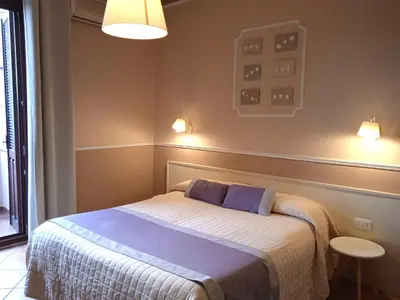 Letto o letti in una camera di Hotel Moderno