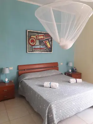 Letto o letti in una camera di Ethos Rooms