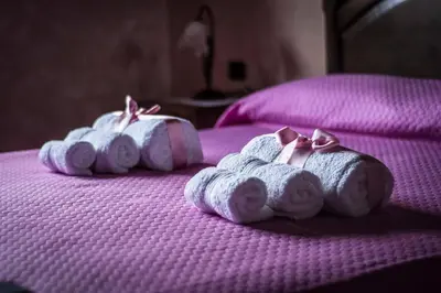 Letto o letti in una camera di Casa Vacanza il Mandorlo