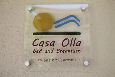 Certificato, attestato, insegna o altro documento esposto da B&B Casa Olla