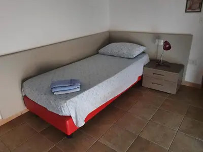 Letto o letti in una camera di B&b Paolo e Daniela