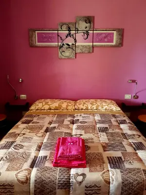Letto o letti in una camera di Is Tanas