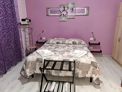 Letto o letti in una camera di Is Tanas
