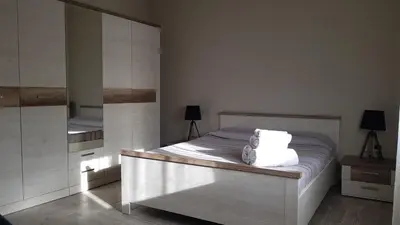 Letto o letti in una camera di Piero's Apartment