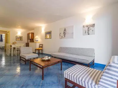 Area soggiorno di Taccarossa casa azzurra