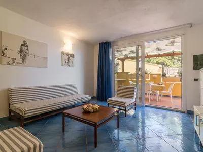 Area soggiorno di Taccarossa casa azzurra