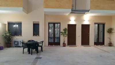 Area soggiorno di Rooms Loru