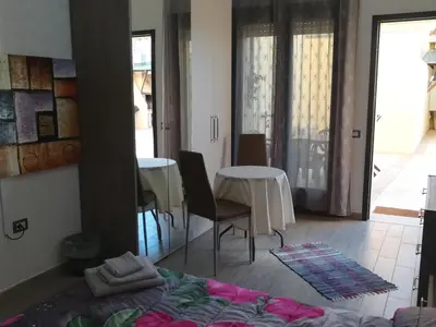 Area soggiorno di Rooms Loru