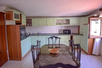 Cucina o angolo cottura di villa sa perdera