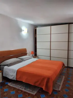 Letto o letti in una camera di Casa Vacanza Dante
