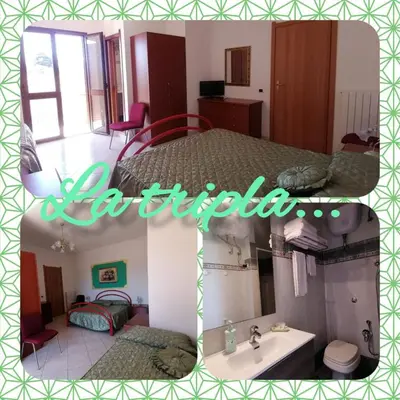 Letto o letti in una camera di B&B Ida