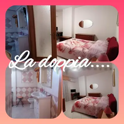 Letto o letti in una camera di B&B Ida