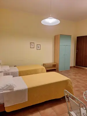 Letto o letti in una camera di B&B Casa Piras IUN3880