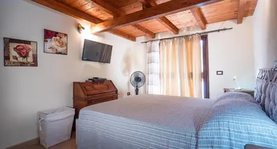 Letto o letti in una camera di Casa Vacanze 