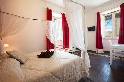 Letto o letti in una camera di Suite Cagliaritane Notti in centro