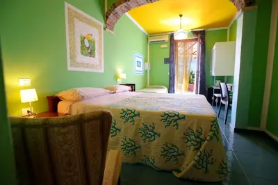 Letto o letti in una camera di Hotel Villa Belfiori