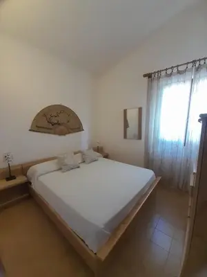 Letto o letti in una camera di Nuova Valmar 