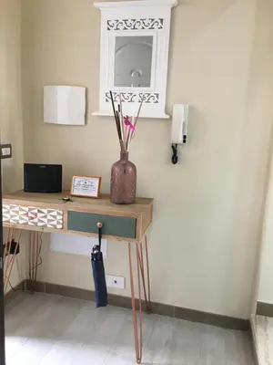 TV o dispositivi per l'intrattenimento presso Flamingo Luxury Apartment AJPSARDINIA
