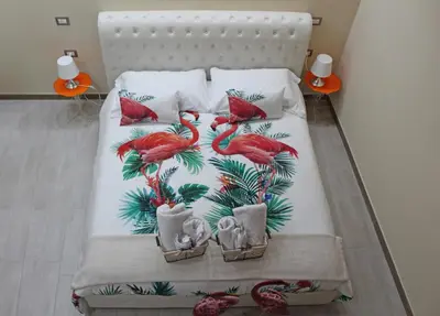Letto o letti in una camera di Flamingo Luxury Apartment AJPSARDINIA