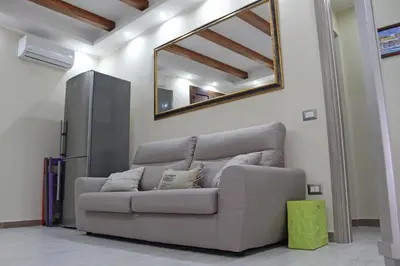 Area soggiorno di Flamingo Luxury Apartment AJPSARDINIA