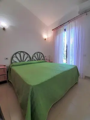 Letto o letti in una camera di Nuova Valmar 