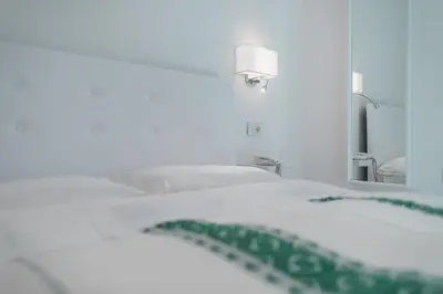 Letto o letti in una camera di Hotel Fiore Di Maggio