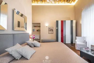 Letto o letti in una camera di Il Regio Maison di Charme
