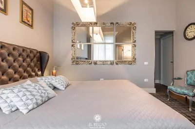 Letto o letti in una camera di Il Regio Maison di Charme
