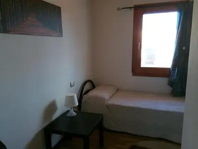 Letto o letti in una camera di Casa vacanza Carla