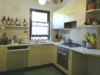 Cucina o angolo cottura di Villetta nella Pineta Santa Margherita di Pula