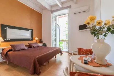Letto o letti in una camera di Marina Di Castello