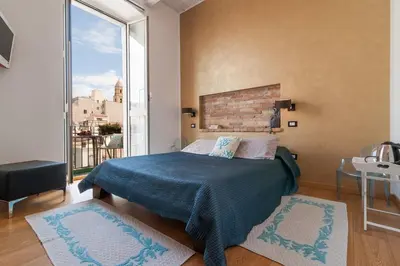 Letto o letti in una camera di Marina Di Castello