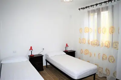 Letto o letti in una camera di Pineta Spiaggia Grande 2