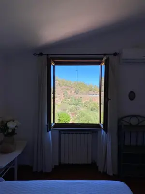 Letto o letti in una camera di La Rosa dei Venti