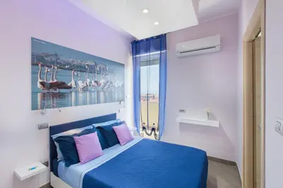 Letto o letti in una camera di A View on Cagliari