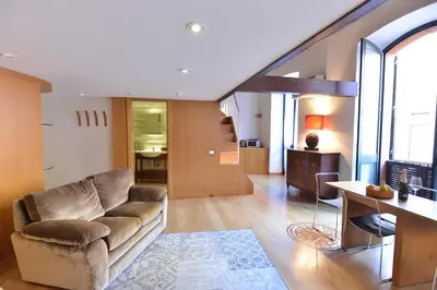 Area soggiorno di IzzHome Full Center Grand