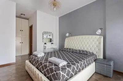 Letto o letti in una camera di Cagliari Centro Città Rooms