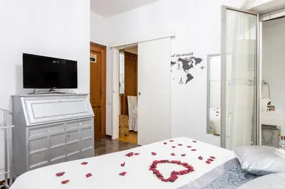 Letto o letti in una camera di Cagliari Centro Città Rooms