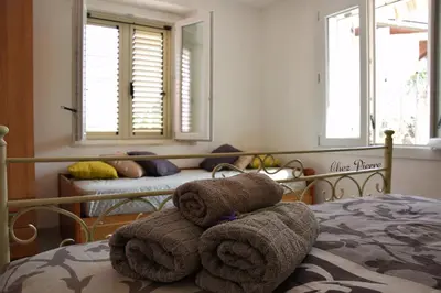 Letto o letti in una camera di Chez Pierre