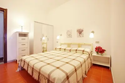 Letto o letti in una camera di Pinus Village Sea Front Apartment