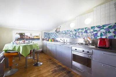 Cucina o angolo cottura di La Terrazza Sul Porto